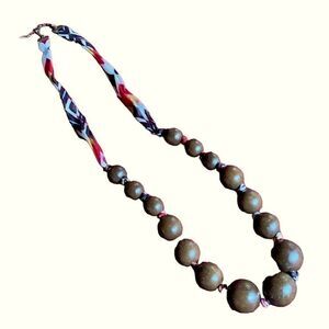 Marks and Spencer’s chunky wood and ribbon Necklace 35-38” long